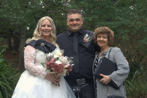 Debbie with the bride and groom.